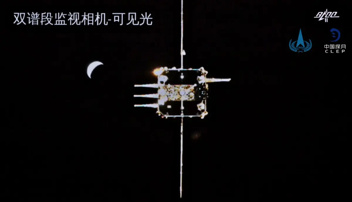 我国首次实现月球轨道交会对接，嫦娥五号探测器完成在轨样品转移