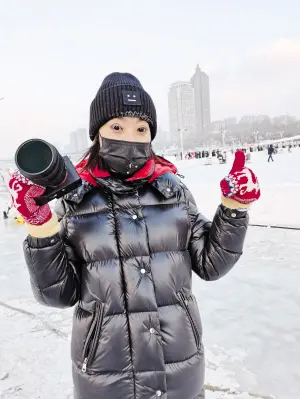 旅游达人：拍摄冰雪出特辑 为温暖东北发声