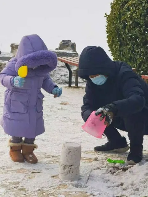 视点｜下雪啦 市民北京柳荫公园赏雪玩乐