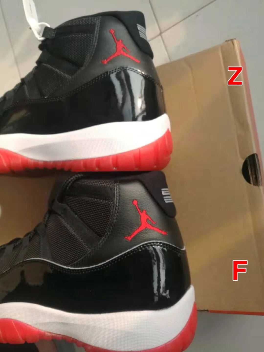 aj11季后赛黑红配色和aj13熊猫配色的真假对比